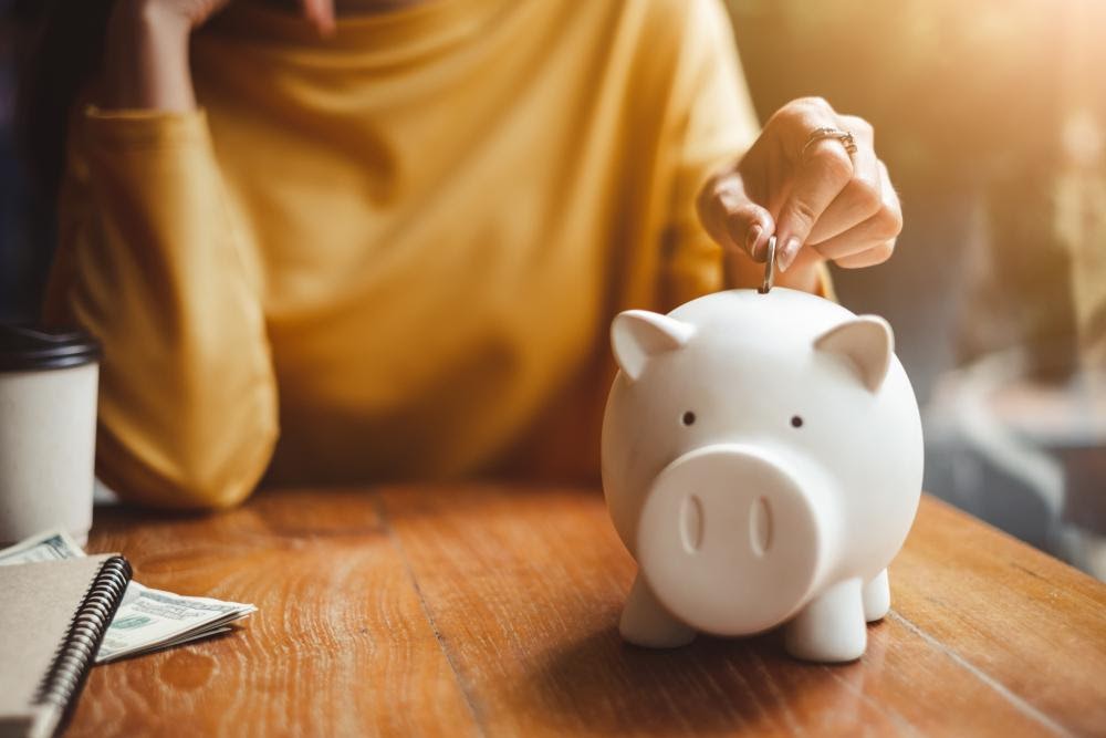 Woman saving her earnings