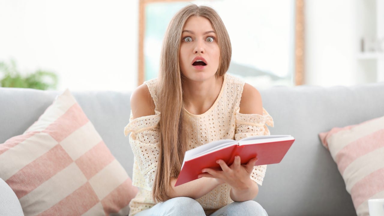 shocked woman looking at a planner