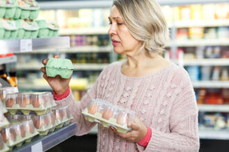 Woman shopping the perimeter of the store