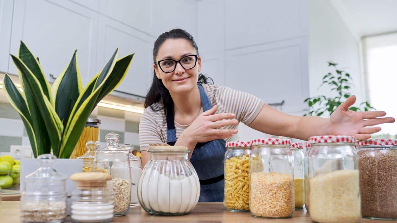 Woman in kitchen preparing ingredients