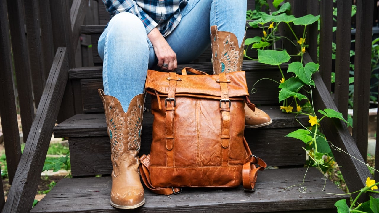 Cowboy Boots and Leather Bag