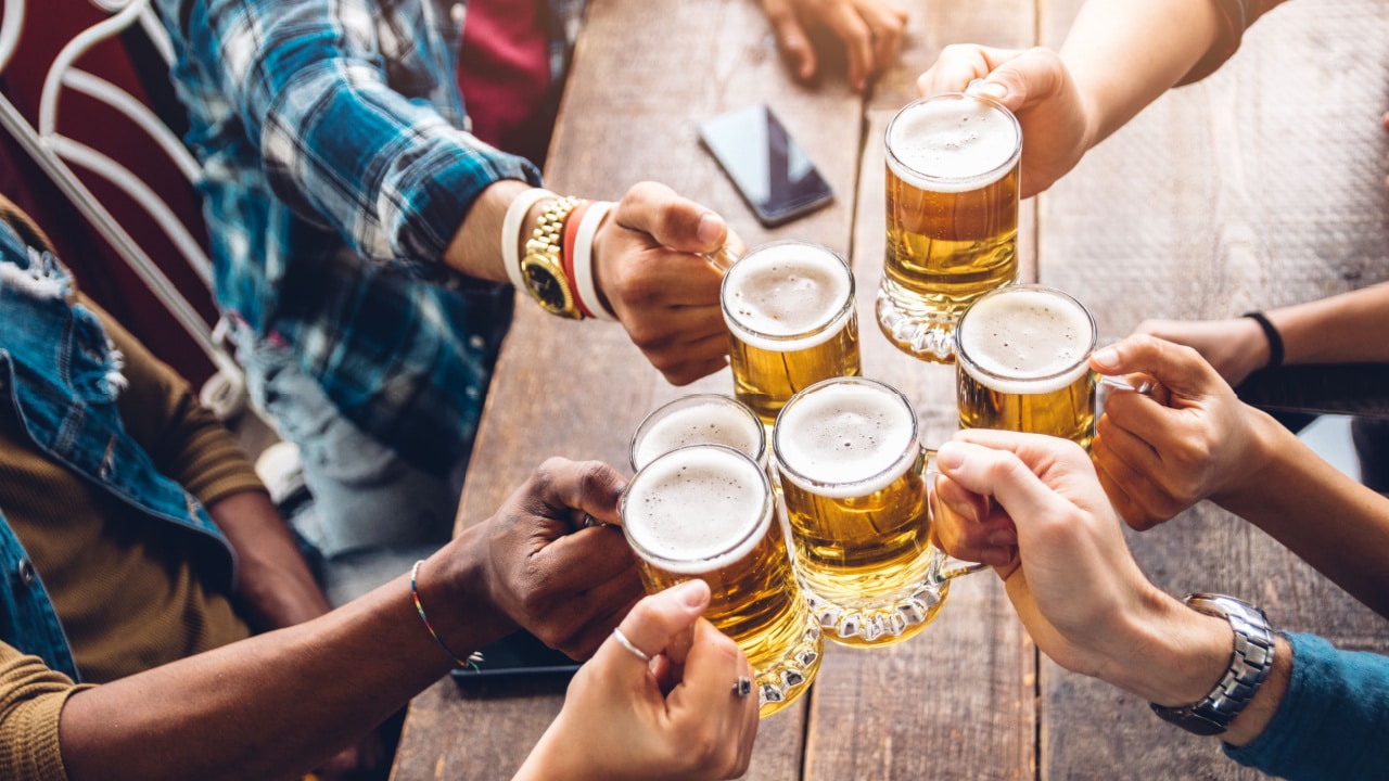 Happy hour toast with beers