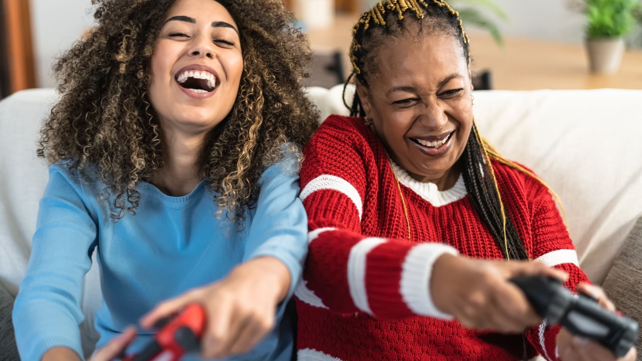 Two women playing video games.