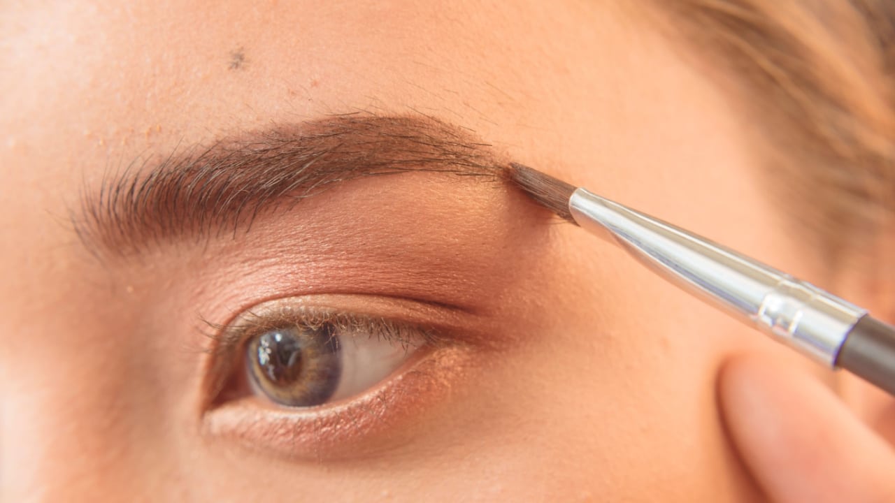 Close up of eyebrow filler being applied