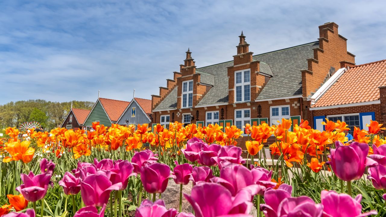 Holland, Michigan- May 13, 2022 : Exterior view of historic Dutch style shops at Windmill island gardens in Holland, Michigan.